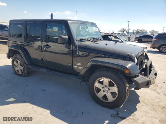 2011 Jeep Wrangler Unlimited Sahara with VIN 1J4HA5H1XBL619601, listed as a Copart auction lot 47041385 with 139,713 mi miles and Clean Title. Bid and sale history available at carsss.com. Image 4.