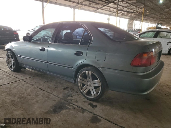 2000 Honda Civic LX with VIN 2HGEJ6677YH532512, listed as a Copart auction lot 75494574 with 160,317 mi miles and Salvage Title. Bid and sale history available at carsss.com. Image 2.