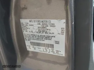 2005 Ford Escape Hybrid with VIN 1FMCU95H55KC07544, listed as a IAAI auction lot 42104756 with 250,109 mi miles. Bid and sale history available at carsss.com. Image 9.
