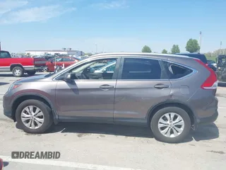2014 Honda CR-V EX-L with VIN 5J6RM4H70EL096555, listed as a IAAI auction lot 42038062 with 113,601 mi miles. Bid and sale history available at carsss.com. Image 14.