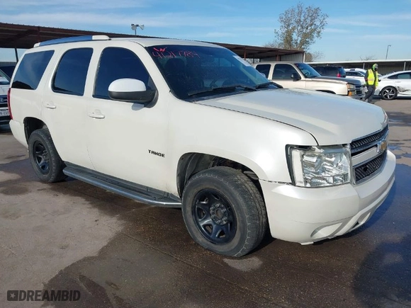 2012 Chevrolet Tahoe Commercial with VIN 1GNLC2E0XCR185593, listed as a IAAI auction lot 41217784 with 150,419 mi miles. Bid and sale history available at carsss.com. Image 1.