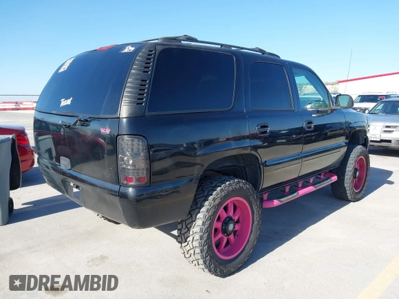 2004 Chevrolet Tahoe LT with VIN 1GNEC13ZX4R234118, listed as a IAAI auction lot 41840881 with 360,534 mi miles and . Bid and sale history available at DreamBid. Image 4.