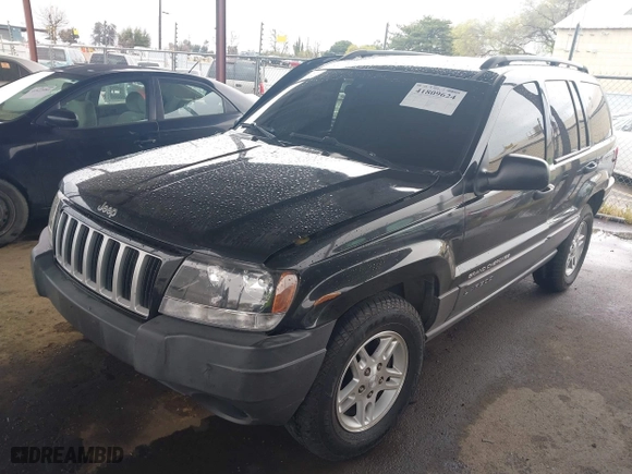 2004 Jeep Grand Cherokee Laredo with VIN 1J4GX48N94C435700, listed as a IAAI auction lot 41809624 with 147,413 mi miles. Bid and sale history available at carsss.com. Image 2.