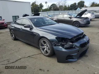2014 BMW M6 z VIN WBS6C9C56ED467395, wystawiony jako Copart lot #45427405 z przebiegiem 91 506 mil mil oraz Szkoda całkowita • Salvage title. Historia ofert i sprzedaży dostępna na DreamBid. Obrazek 4.