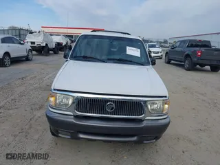 2000 Mercury Mountaineer with VIN 4M2ZU66P9YUJ19036, listed as a IAAI auction lot 41663230 with 159,635 mi miles. Bid and sale history available at carsss.com. Image 6.