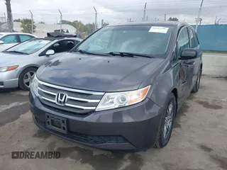 2011 Honda Odyssey EX-L with VIN 5FNRL5H61BB072124, listed as a IAAI auction lot 42115299 with 155,086 mi miles and . Bid and sale history available at DreamBid. Image 17.