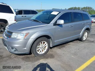 2015 Dodge Journey SXT with VIN 3C4PDCBG4FT656826, listed as a IAAI auction lot 41981425 with 131,847 mi miles. Bid and sale history available at carsss.com. Image 2.
