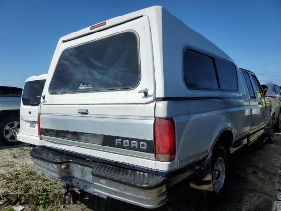1995 Ford F-150 with VIN 1FTEX15H2SKA69401, listed as a Copart auction lot 76022674 with 0 mi miles and Non Repairable. Bid and sale history available at carsss.com. Image 3.