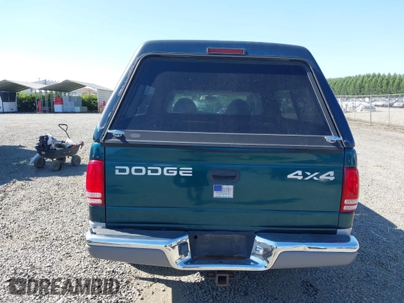 1999 Dodge Dakota SLT with VIN 1B7GG22Y2XS157214, listed as a IAAI auction lot 39776504 with 144,928 mi miles and . Bid and sale history available at carsss.com. Image 16.