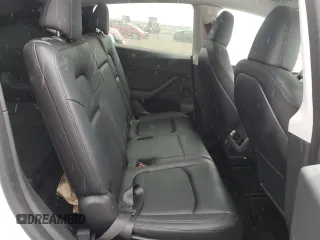 2023 Tesla Model Y Long Range z VIN 7SAYGAEE0PF693613, wystawiony jako Copart lot #54452895 z przebiegiem 19 574 mil mil oraz Szkoda całkowita • Salvage title. Historia ofert i sprzedaży dostępna na DreamBid. Obrazek 10.