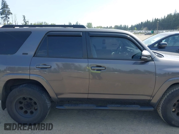 2015 Toyota 4Runner Limited with VIN JTEBU5JR9F5270455, listed as a IAAI auction lot 42157052 with 141,866 mi miles and . Bid and sale history available at carsss.com. Image 13.