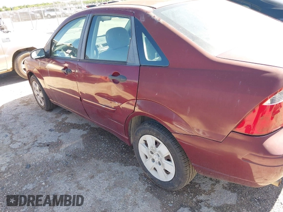 2007 Ford Focus S with VIN 1FAFP34N77W297780, listed as a IAAI auction lot 42074788 with 153,441 mi miles and . Bid and sale history available at carsss.com. Image 12.