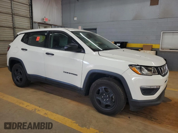 2018 Jeep Compass Sport with VIN 3C4NJCAB5JT263397, listed as a Copart auction lot 55670315 with 95,531 mi miles and Salvage title. Bid and sale history available at DreamBid. Image 4.