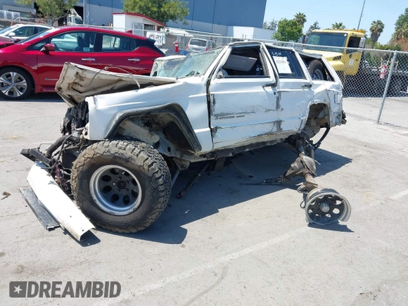 2001 Jeep Cherokee Sport z VIN 1J4FF48S11L596106, wystawiony jako IAAI lot #42213850 z przebiegiem Nie podano mil oraz . Historia ofert i sprzedaży dostępna na DreamBid. Obrazek 17.