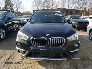 2017 BMW X1 sDrive28i with VIN WBXHU7C30H5H33353, listed as a Copart auction lot 47473445 with 97,579 mi miles and Salvage Title. Bid and sale history available at carsss.com. Image 5.