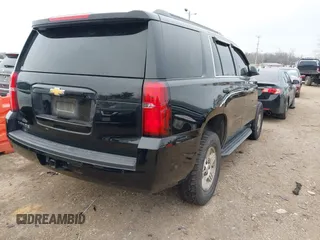 2020 Chevrolet Tahoe LS z VIN 1GNSCAKC1LR177807, wystawiony jako IAAI lot #41482578 z przebiegiem 75 010 mil mil oraz . Historia ofert i sprzedaży dostępna na DreamBid. Obrazek 4.