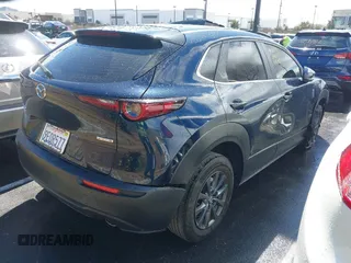 2023 Mazda CX-30 S with VIN 3MVDMBAM9PM541315, listed as a IAAI auction lot 41758162 with 46,296 mi miles and . Bid and sale history available at carsss.com. Image 4.