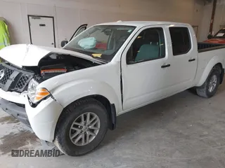 2018 Nissan Frontier SV z VIN 1N6DD0FV7JN718221, wystawiony jako IAAI lot #42118492 z przebiegiem 132 413 mil mil oraz . Historia ofert i sprzedaży dostępna na DreamBid. Obrazek 17.