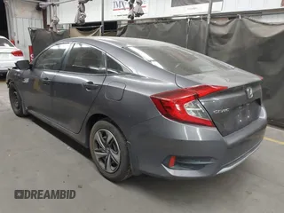 2020 Honda Civic LX with VIN 19XFC2F67LE006057, listed as a IAAI auction lot 42032759 with 119,319 mi miles and . Bid and sale history available at DreamBid. Image 3.