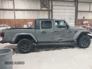 2021 Jeep Gladiator Mojave z VIN 1C6JJTEG5ML524829, wystawiony jako IAAI lot #42247982 z przebiegiem 20 158 mil mil oraz . Historia ofert i sprzedaży dostępna na DreamBid. Obrazek 13.