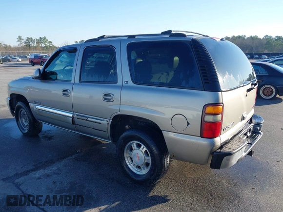 2001 GMC Yukon SLT with VIN 1GKEK13T11R168999, listed as a IAAI auction lot 41778926 with 163,388 mi miles. Bid and sale history available at carsss.com. Image 3.