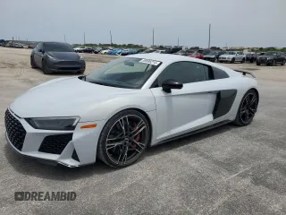 2020 Audi R8 z VIN WUAKBAFX9L7900195, wystawiony jako Copart lot #59888215 z przebiegiem 16 548 mil mil oraz Tytuł czysty. Historia ofert i sprzedaży dostępna na DreamBid. Obrazek 1.