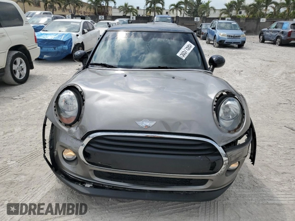 2018 MINI Hardtop Cooper with VIN WMWXP5C56J2H29012, listed as a Copart auction lot 50571595 with 77,129 mi miles and Salvage title. Bid and sale history available at DreamBid. Image 5.