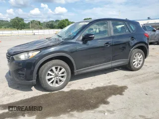 2016 Mazda CX-5 Sport with VIN JM3KE4BY0G0634219, listed as a Copart auction lot 60033525 with 139,346 mi miles and Salvage title. Bid and sale history available at DreamBid. Image 1.