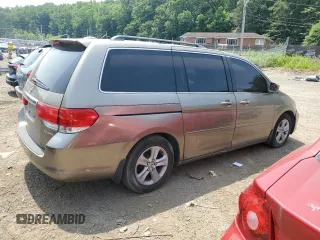 2008 Honda Odyssey Touring z VIN 5FNRL38968B025520, wystawiony jako Copart lot #60799645 z przebiegiem 116 592 mil mil oraz Szkoda całkowita • Salvage title. Historia ofert i sprzedaży dostępna na DreamBid. Obrazek 3.