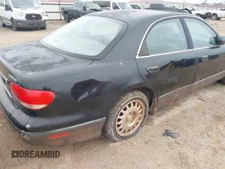 2001 Mazda Millenia z VIN JM1TA221711710228, wystawiony jako IAAI lot #41435837 z przebiegiem 152 445 mil mil oraz . Historia ofert i sprzedaży dostępna na DreamBid. Obrazek 12.