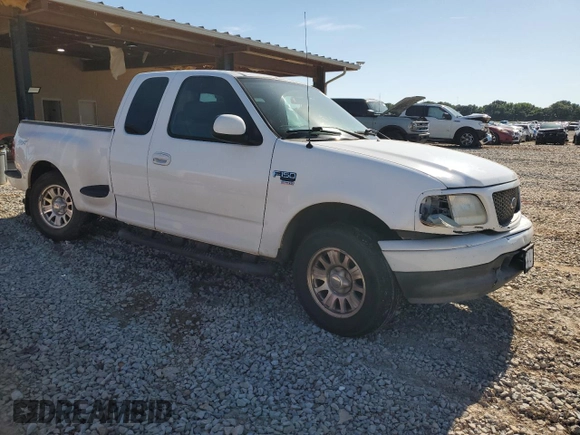 2003 Ford F-150 XL with VIN 1FTRX07W03KD12910, listed as a Copart auction lot 57864555 with Not provided miles and Salvage title. Bid and sale history available at DreamBid. Image 4.
