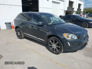2015 Volvo XC60 T5 Drive-E Premier Plus with VIN YV440MDC7F2606774, listed as a IAAI auction lot 41564034 with 166,758 mi miles. Bid and sale history available at carsss.com. Image 1.