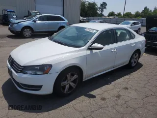2012 Volkswagen Passat SE with VIN 1VWBP7A38CC091797, listed as a Copart auction lot 62032205 with 198,594 mi miles and Clean title. Bid and sale history available at DreamBid. Image 1.