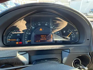 2005 Mercedes-Benz G-Class with VIN WDCYR49EX5X160815, listed as a Copart auction lot 85263464 with 99,770 mi miles and Clean Title. Bid and sale history available at carsss.com. Image 6.