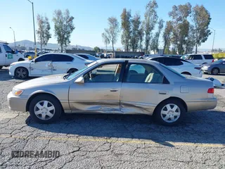 2001 Toyota Camry CE with VIN JT2BG22KX10559757, listed as a IAAI auction lot 41823719 with 72,775 mi miles. Bid and sale history available at carsss.com. Image 14.