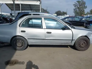 2000 Toyota Corolla VE with VIN 1NXBR12E6YZ393077, listed as a IAAI auction lot 42111914 with 181,056 mi miles and . Bid and sale history available at DreamBid. Image 14.