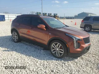 2021 Cadillac XT4 AWD Sport with VIN 1GYFZFR49MF042933, listed as a Copart auction lot 44150315 with 21,926 mi miles and Salvage title. Bid and sale history available at DreamBid. Image 4.