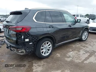 2021 BMW X5 xDrive45e with VIN 5UXTA6C02M9F88978, listed as a IAAI auction lot 42201563 with 23,339 mi miles and . Bid and sale history available at DreamBid. Image 4.