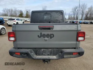2023 Jeep Gladiator Willys z VIN 1C6HJTAG0PL507803, wystawiony jako Copart lot #48526875 z przebiegiem 51 811 mil mil oraz Czysty tytuł • Clean title. Historia ofert i sprzedaży dostępna na DreamBid. Obrazek 6.