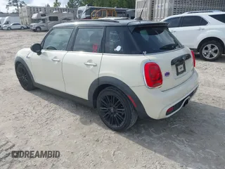 2017 MINI Hardtop 4 Door Cooper S z VIN WMWXU3C54H2D32602, wystawiony jako IAAI lot #41458333 z przebiegiem 124 235 mil mil oraz . Historia ofert i sprzedaży dostępna na DreamBid. Obrazek 3.