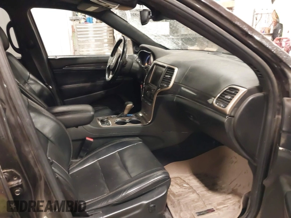 2016 Jeep Grand Cherokee High Altitude with VIN 1C4RJFCG1GC495706, listed as a IAAI auction lot 40770517 with 225,538 mi miles. Bid and sale history available at carsss.com. Image 5.