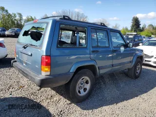 1999 Jeep Cherokee Sport with VIN 1J4FT68S1XL577603, listed as a Copart auction lot 54216115 with 180,128 mi miles and Salvage title. Bid and sale history available at DreamBid. Image 3.