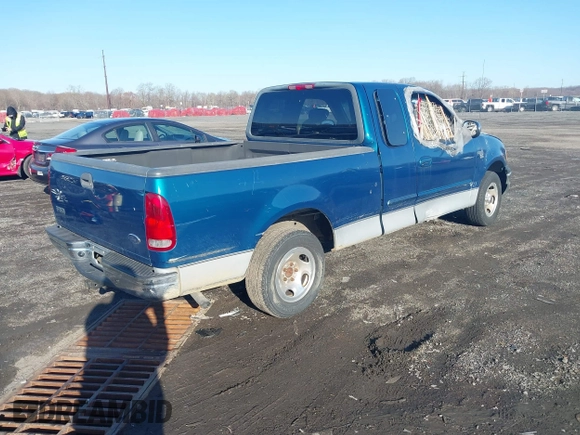 2001 Ford F-150 XL with VIN 1FTRX17W71NA81344, listed as a IAAI auction lot 41840571 with 143,938 mi miles and . Bid and sale history available at DreamBid. Image 4.