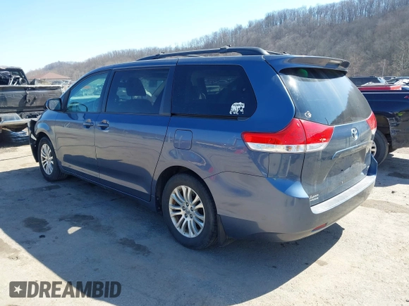 2013 Toyota Sienna XLE AAS with VIN 5TDYK3DC0DS398381, listed as a IAAI auction lot 41773688 with 169,055 mi miles. Bid and sale history available at carsss.com. Image 3.