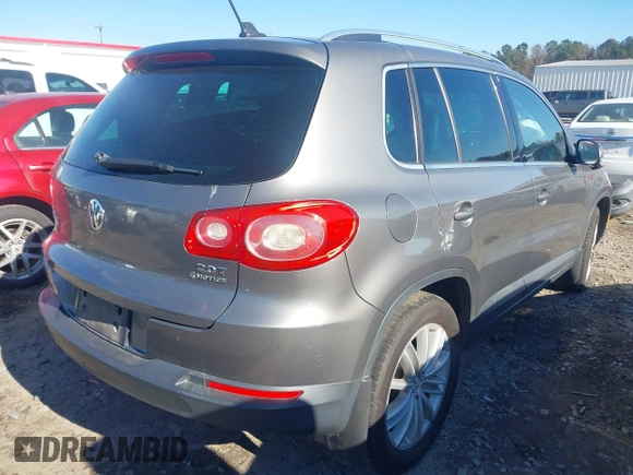 2011 Volkswagen Tiguan SE with VIN WVGBV7AX7BW538690, listed as a IAAI auction lot 41338881 with Not Provided miles and . Bid and sale history available at DreamBid. Image 4.