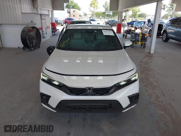 2022 Honda Civic Sport Touring z VIN 19XFL1H8XNE016822, wystawiony jako IAAI lot #42113420 z przebiegiem 30 361 mil mil oraz . Historia ofert i sprzedaży dostępna na DreamBid. Obrazek 12.