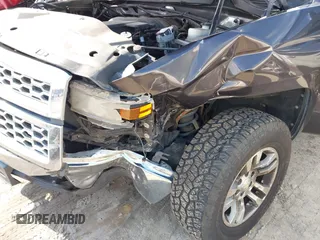 2014 Chevrolet Silverado 1500 LT with VIN 3GCPCREC7EG135069, listed as a IAAI auction lot 41999001 with 208,720 mi miles and . Bid and sale history available at DreamBid. Image 6.