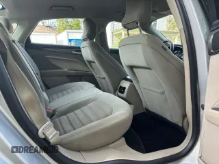 2018 Ford Fusion SE z VIN 3FA6P0LU9JR208728, wystawiony jako Copart lot #56345445 z przebiegiem 183 982 mil mil oraz Czysty tytuł • Clean title. Historia ofert i sprzedaży dostępna na DreamBid. Obrazek 6.
