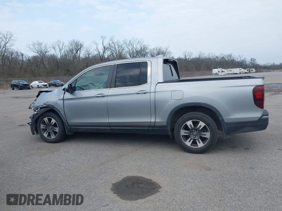 2019 Honda Ridgeline RTL with VIN 5FPYK2F50KB004055, listed as a IAAI auction lot 41576975 with 128,620 mi miles and . Bid and sale history available at DreamBid. Image 14.