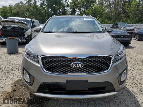 2016 Kia Sorento SX z VIN 5XYPKDA52GG141330, wystawiony jako Copart lot #55448425 z przebiegiem 78 330 mil mil oraz Szkoda całkowita • Salvage title. Historia ofert i sprzedaży dostępna na DreamBid. Obrazek 5.